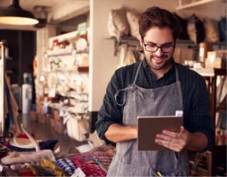 Man Looking at Tablet