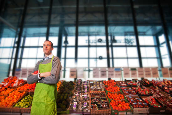 Person in front of produce